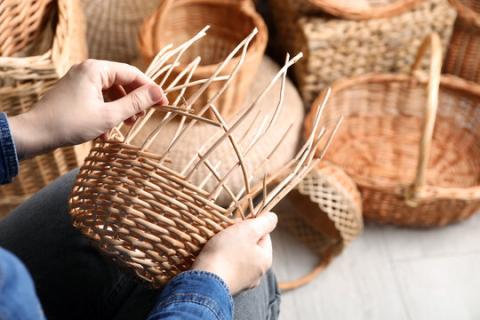 photo of person basket weaving